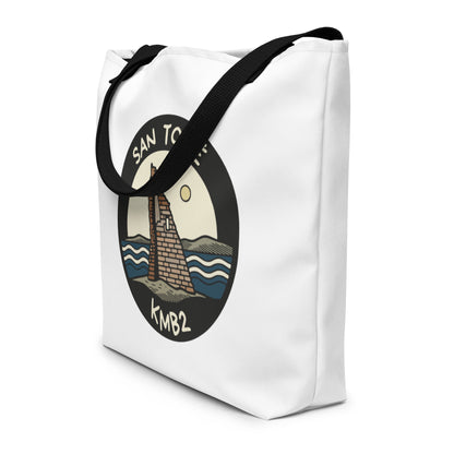 Tote bag San Tomé Black de KMB2, bolsa blanca con asas negras y diseño frontal de la torre