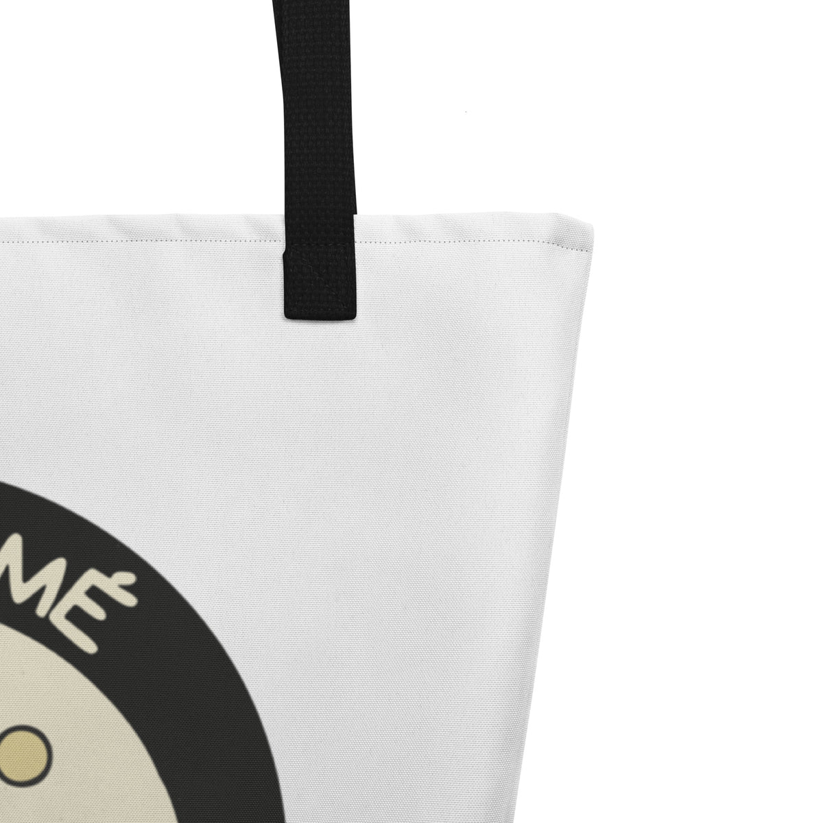 Detalle de la tote bag San Tomé Black: tejido blanco, asa negra y estampado