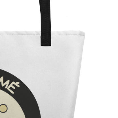 Detalle de la tote bag San Tomé Black: tejido blanco, asa negra y estampado