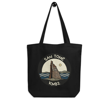 Tote bag negra San Tomé Black Edition, vista frontal con ilustración de la torre y el mar